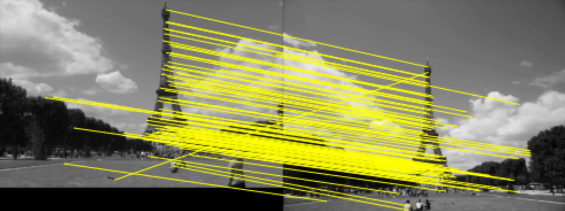 Two images from different viewpoints of a land mark, correspondances detected using SIFT features between the two images are shown with red lines.